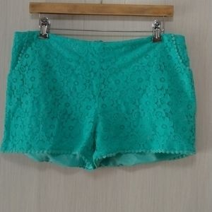 Zouk shorts sz L color teal blue lace in good condition